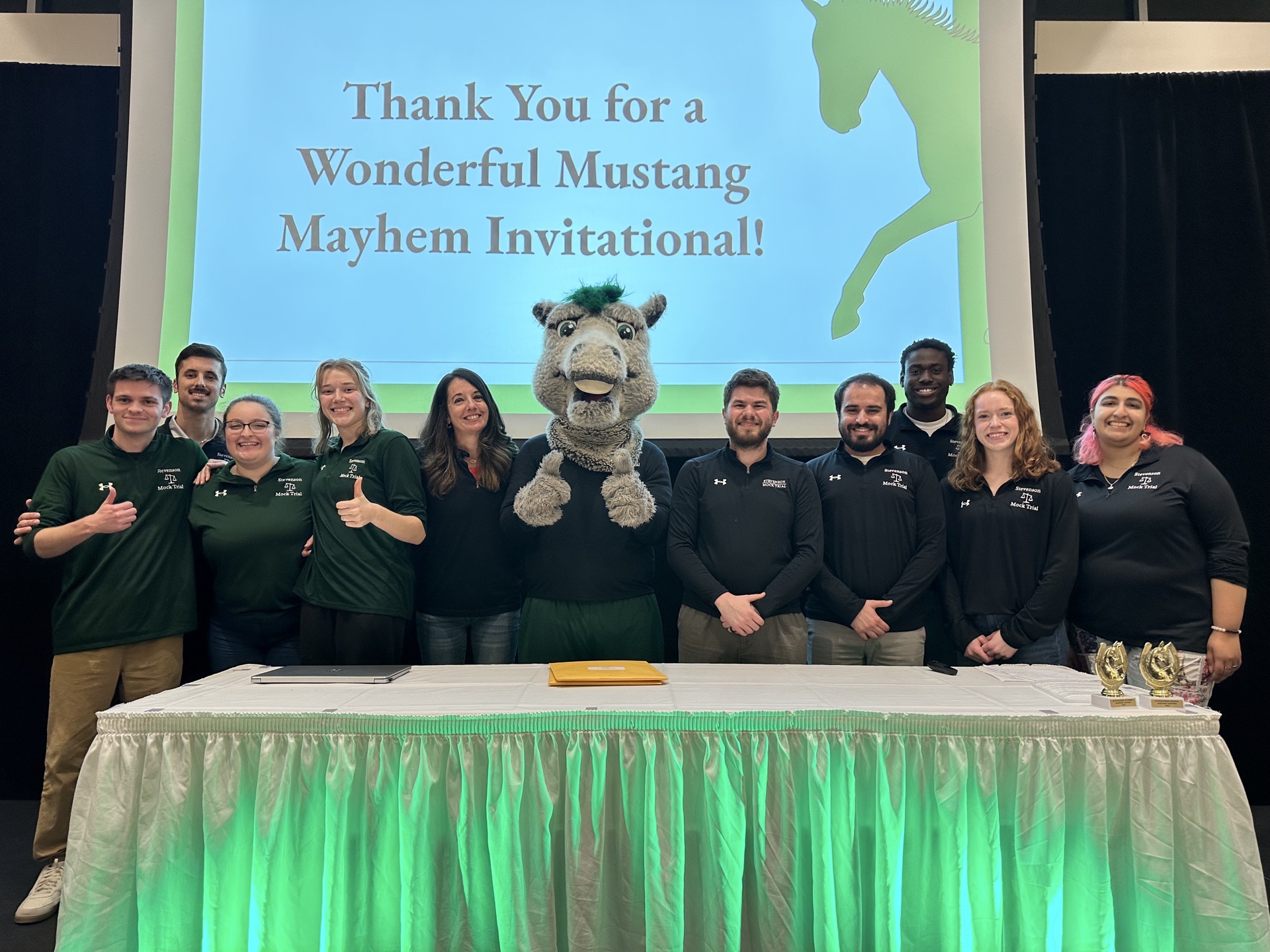 student with Wild Stang (mascot) at Stevenson Mock Trial