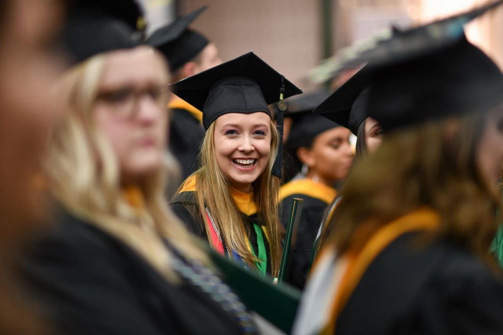 Graduates in cap and gown