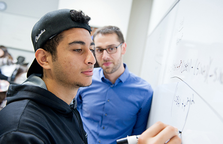 student using whiteboard